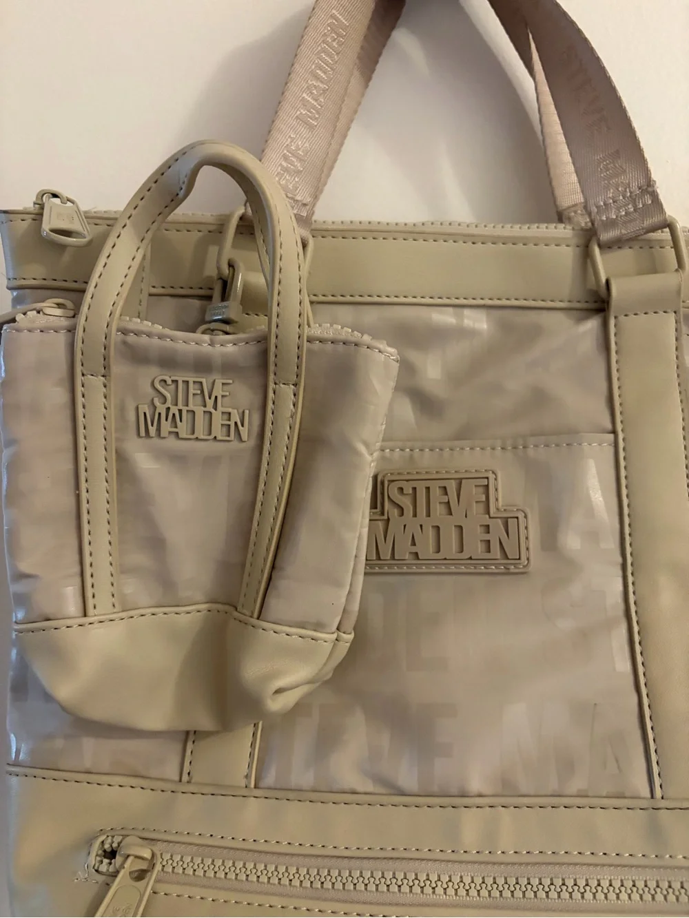 Steve Madden backpack featuring a smaller matching pouch attached